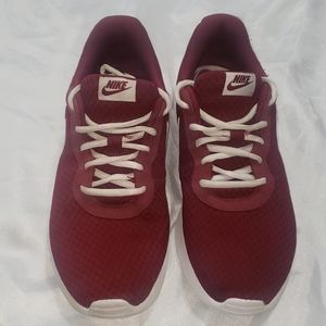Nike burgundy running shoes